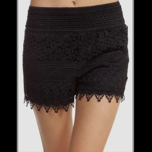 Black Shorts with Intricate Lace Design